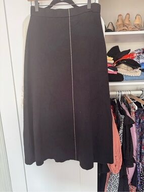 Max Studio Black A-Line Skirt with Center Stitch and matching sweater shirt.